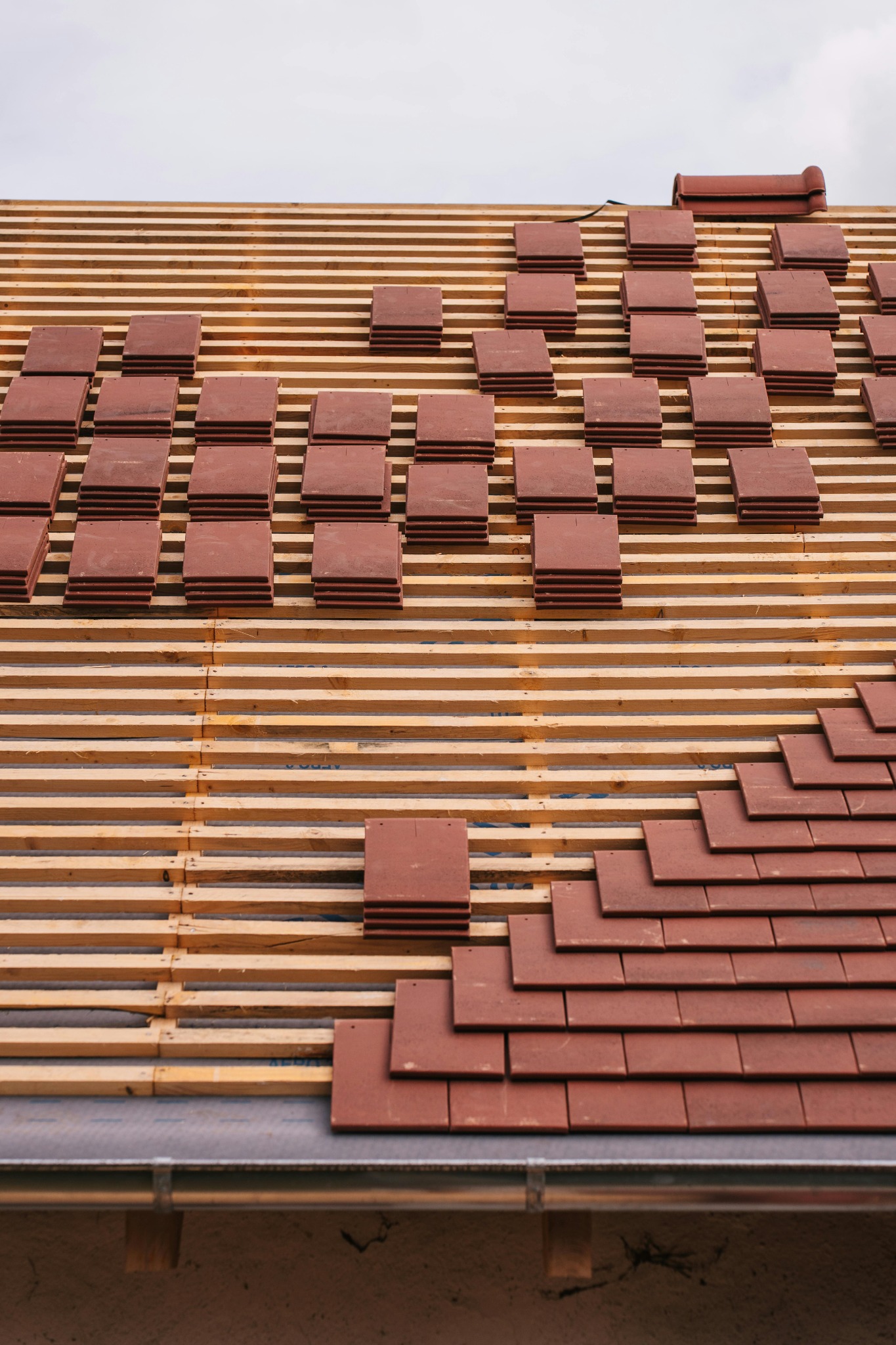 Roof replacement materials being installed